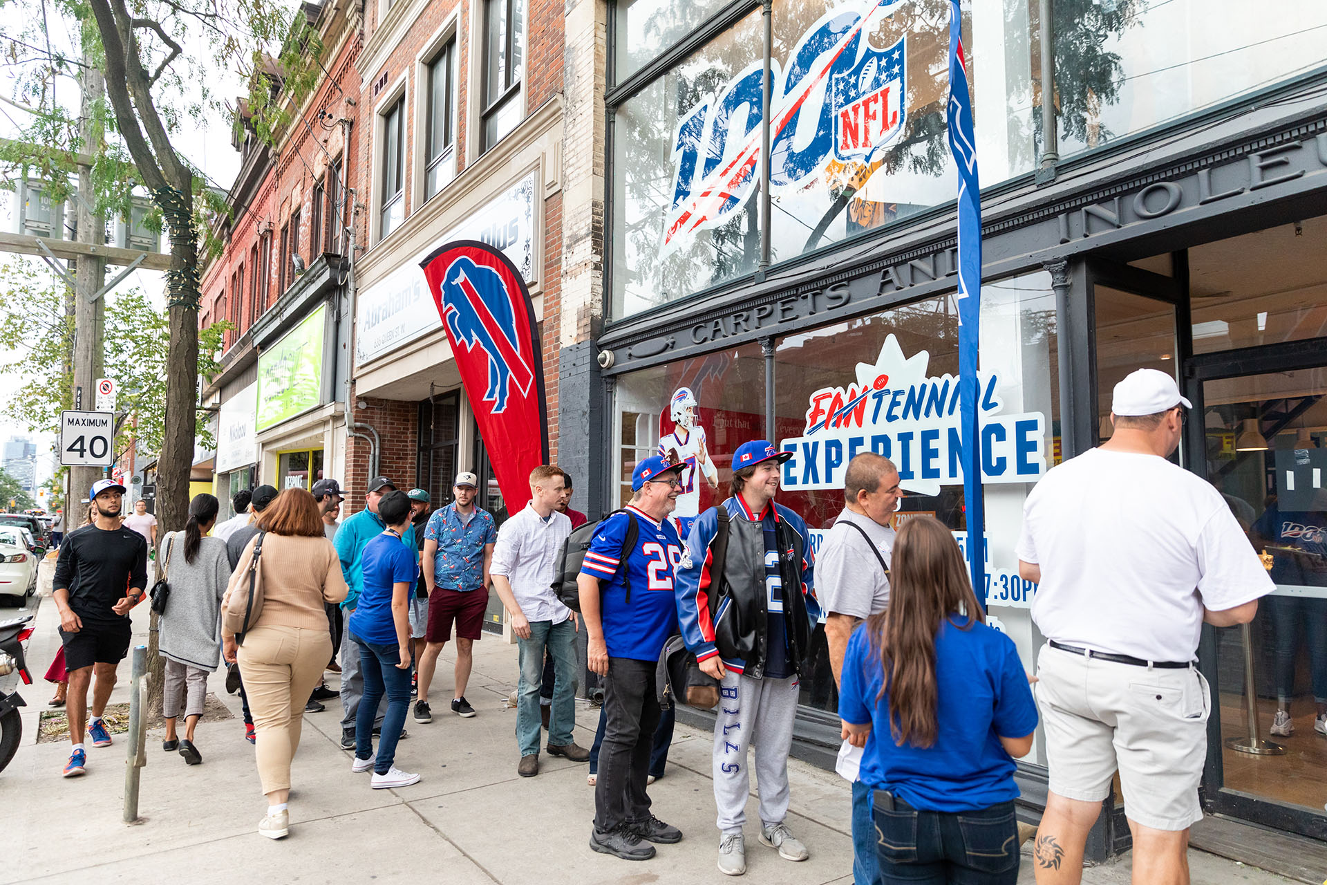 Fans lining up to enter the NFL Fantennial Experience