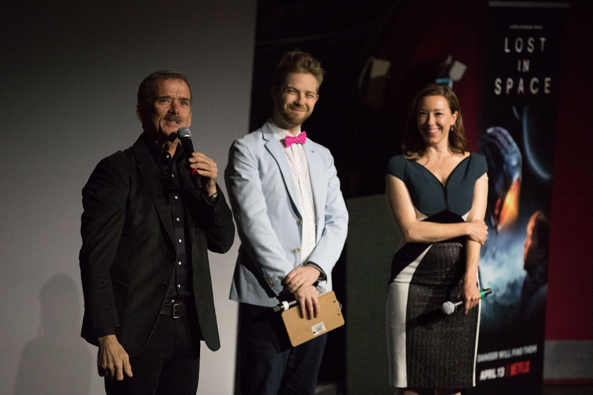 a group of people standing together at a Lost in Space event