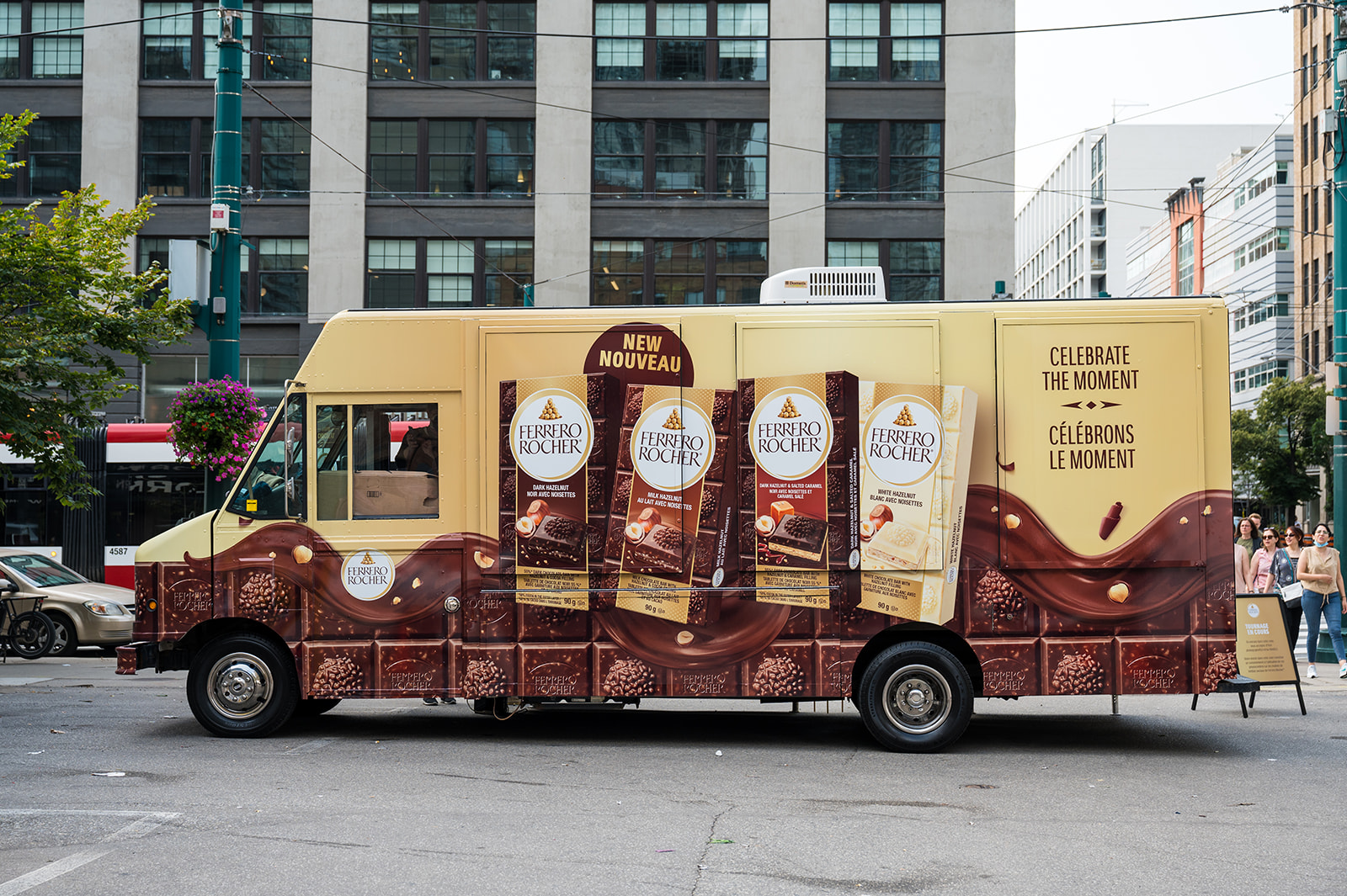 A Truck decorated with Fererro Rocher chocolate bars with the phrase Celebrate the Moment on the side