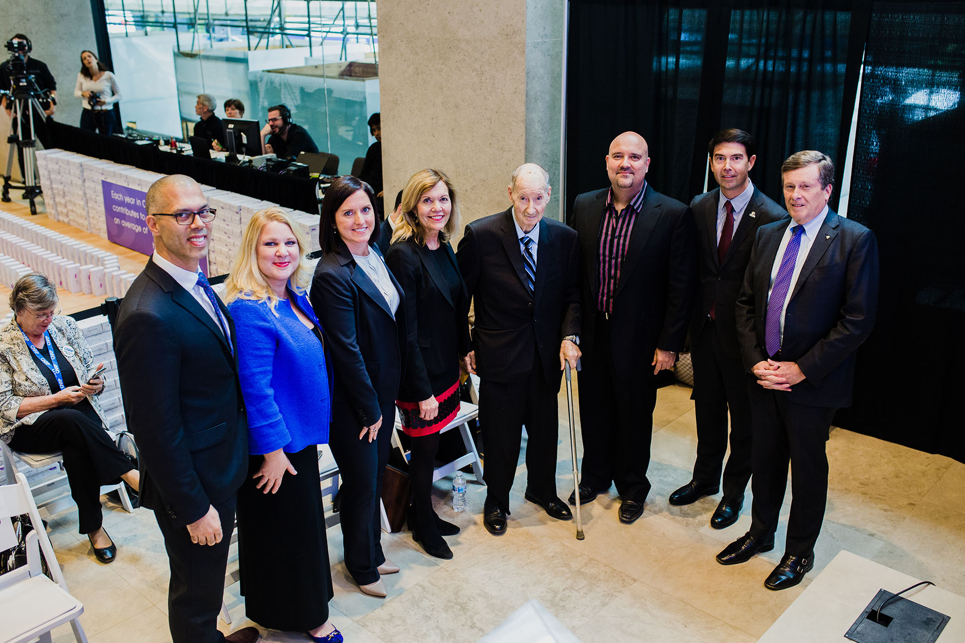 A group of people posing with John Tory