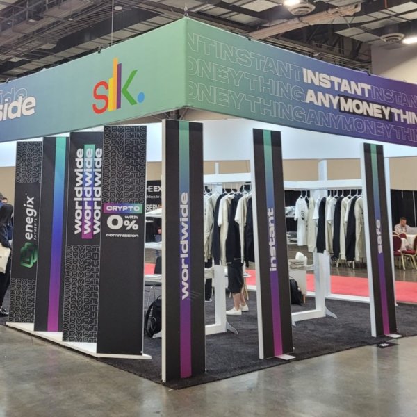 A display stand with clothes hanging up