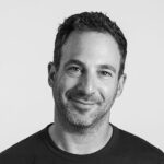 Black and white headshot of Lorne Cooperberg