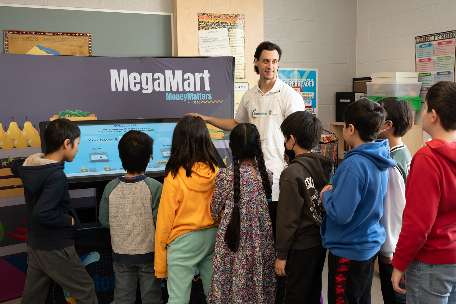 An educator teaching a group of students.